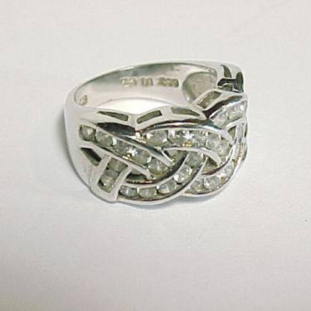 SIZE 5 SOLID STERLING WITH CUBIC STONES RING